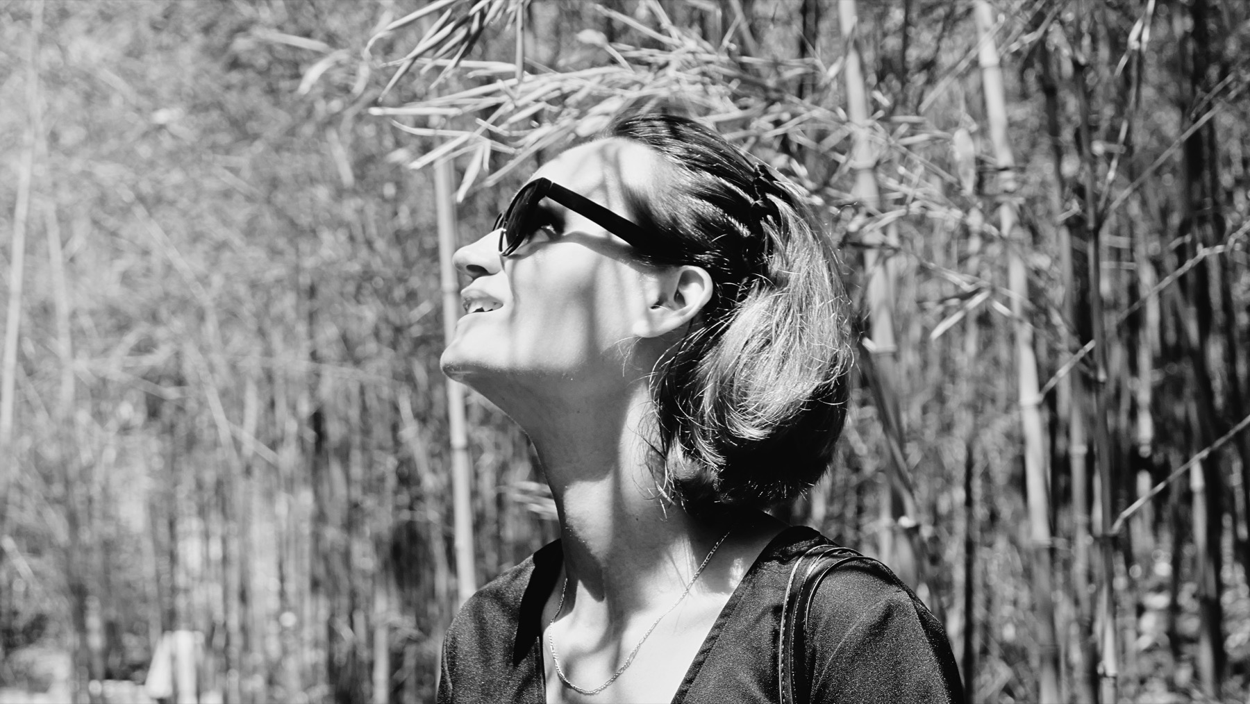 Hristina Cvetinčanin Knežević looking up in a bamboo grove